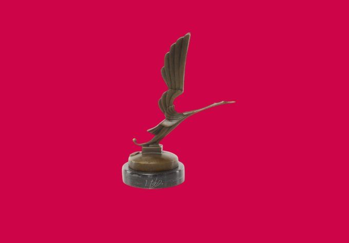 BAD10. Bronze sur marbre d'une mascotte
