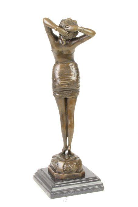 BD04.Bronze sur marbre femme au réveil