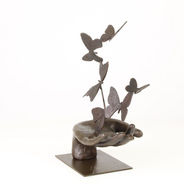 BD37.Exceptionnel bronze d'une main et des papillons