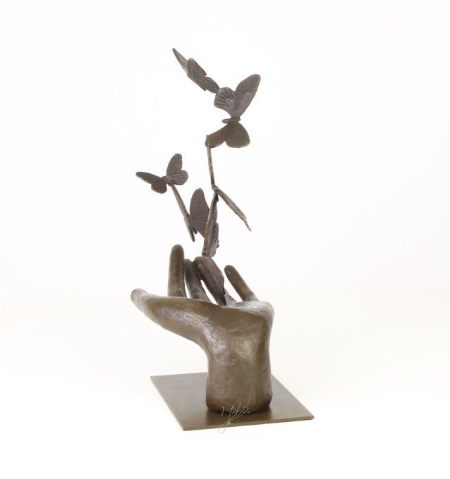 BD37.Exceptionnel bronze d'une main et des papillons